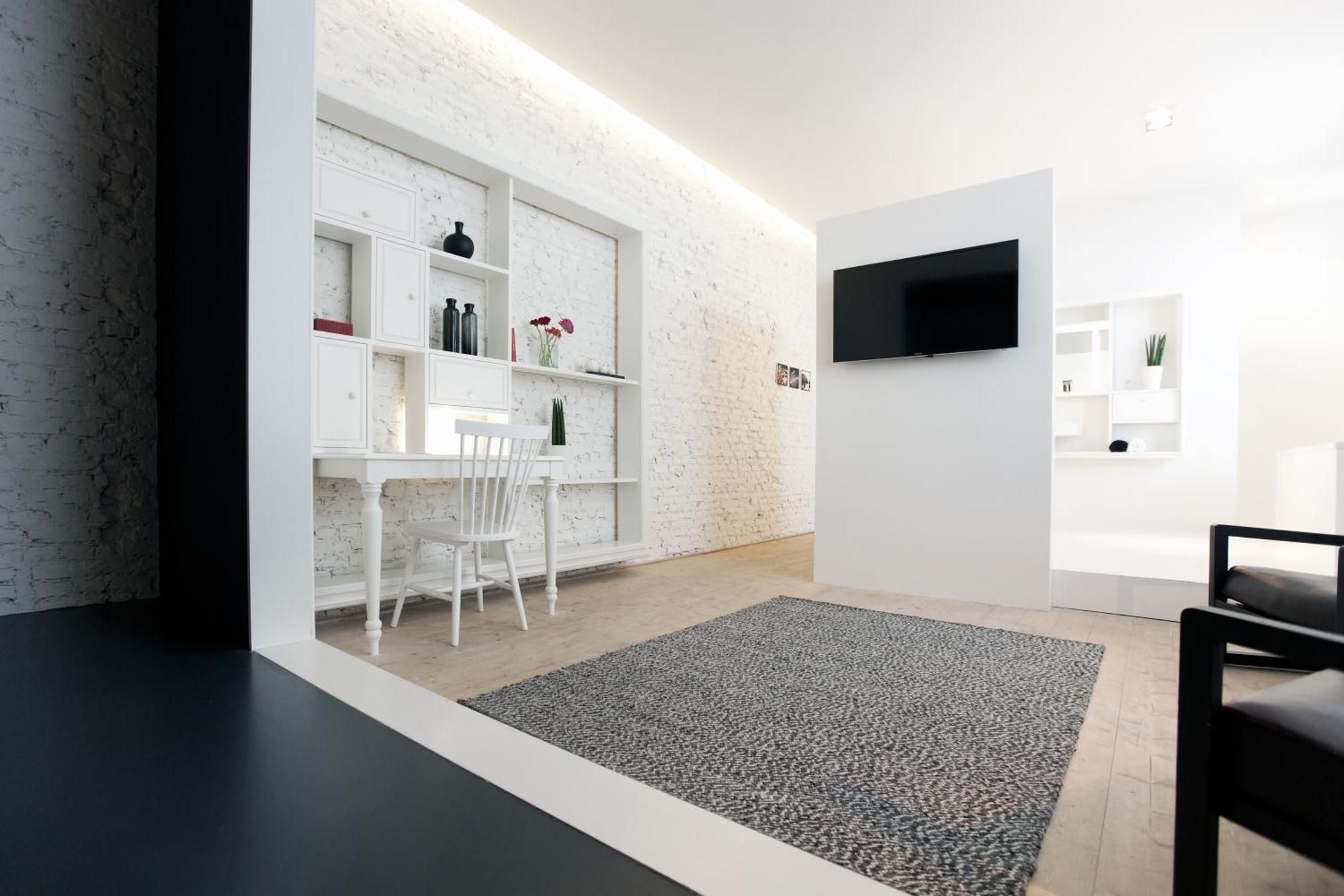 Maison Nationale City Flats & Suites Antwerpen Ruang foto A carpet