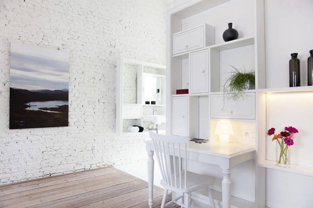 Maison Nationale City Flats & Suites Antwerpen Bagian luar foto A typical room at the hotel